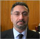 Mr. Emin Carapeti, MBBS MD FRCS (Gen)