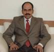Dr. Anil Kamath